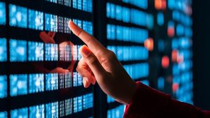 ai-generated-ruka ukazujuca na velke stenove displeje